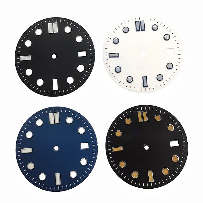 Four vintage-style diving dials with baton hour markers.